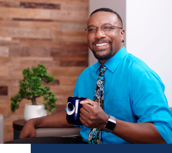 A Supernus employee smiling.