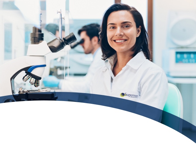 Smiling female scientist in the lab.