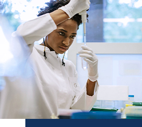A researcher working in a lab.